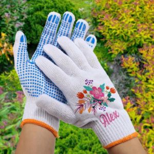 Two hands wearing personalized garden gloves