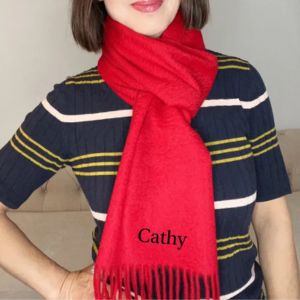 woman wearing red cashmere scarf