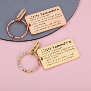 2 little reminder keychains
