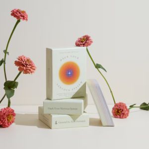 stacked deck of cards that says hack your brain