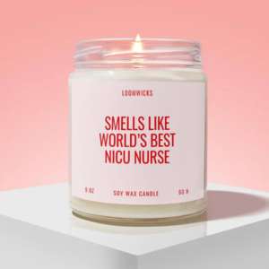 A candle with funny words on it written in red