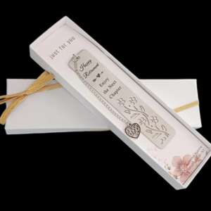 A stainless steel bookmark with a bible verse on it