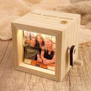 a flip box with image of friends