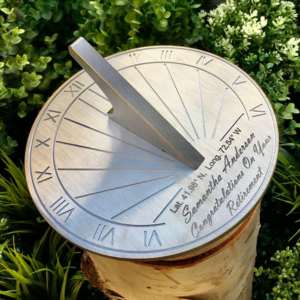 a sun dial in the garden