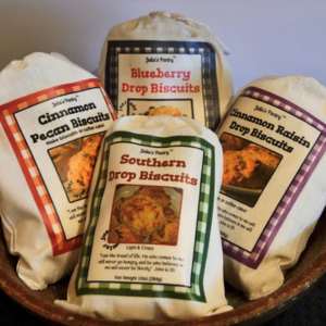 four bags of Biscuit Gift Sampler in a basket