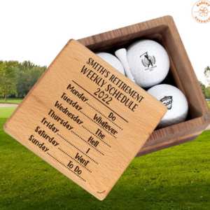 Wooden box engraved with retirement schedule holding golf balls