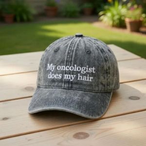 a hat on a table with text on it