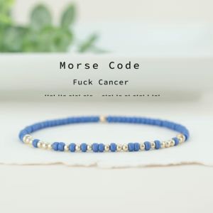 morse code bracelet in blue and gold beads