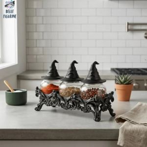 3 apothecary witches hat jar set on a table