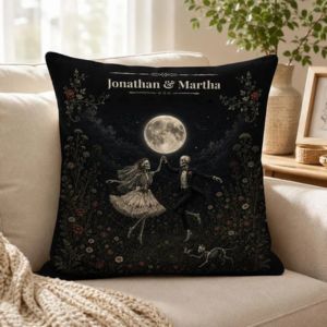 Black pillow with skeleton couple dancing under moon