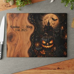 Glass board with pumpkin and castle Halloween scene