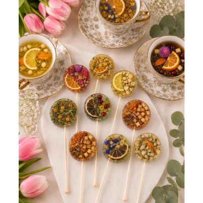Assorted lollipops with dried flowers and fruit inside