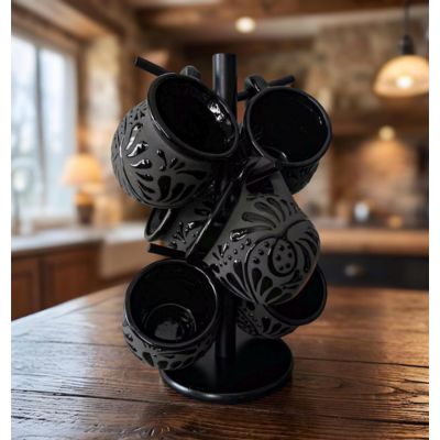 Black hand painted ceramic mugs on stand