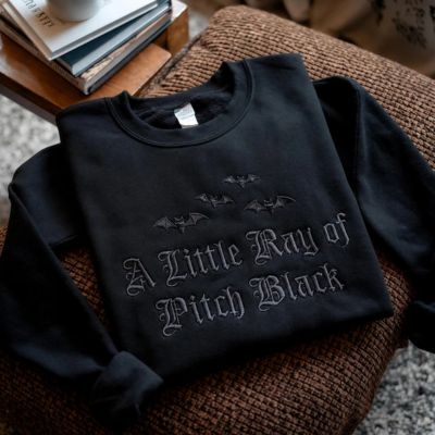 Black sweatshirt with embroidered bats and gothic text