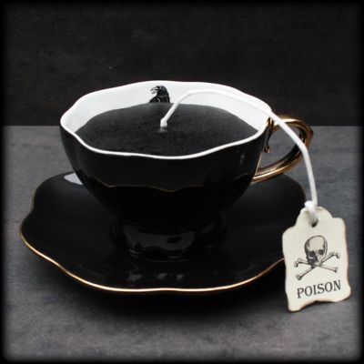 Black teacup candle with raven and poison tag