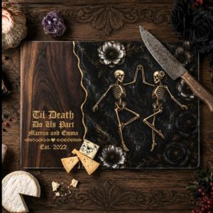 glass cutting board with skeleton dancing couple depicted on it