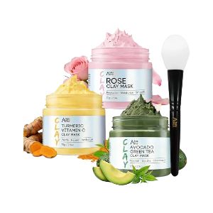 Three-piece clay face mask set with rose, turmeric and avocado masks plus applicator brush.