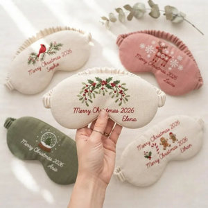 Personalized embroidered Christmas sleep masks in festive colors