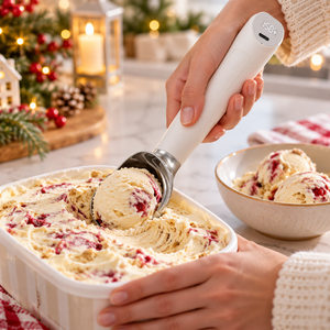 Heated ice cream scoop in use